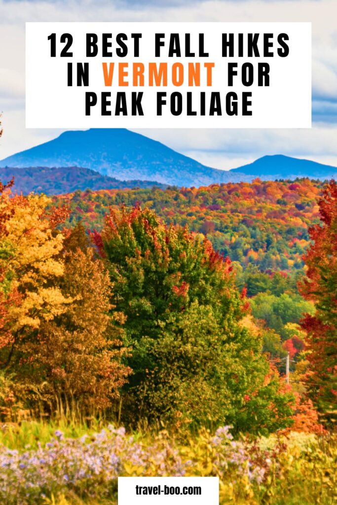 Best Fall Hikes in Vermont Guide: Hiker on the open rocky summit of Camel’s Hump in Vermont looking out over Green Mountain valleys at peak fall foliage in early October.