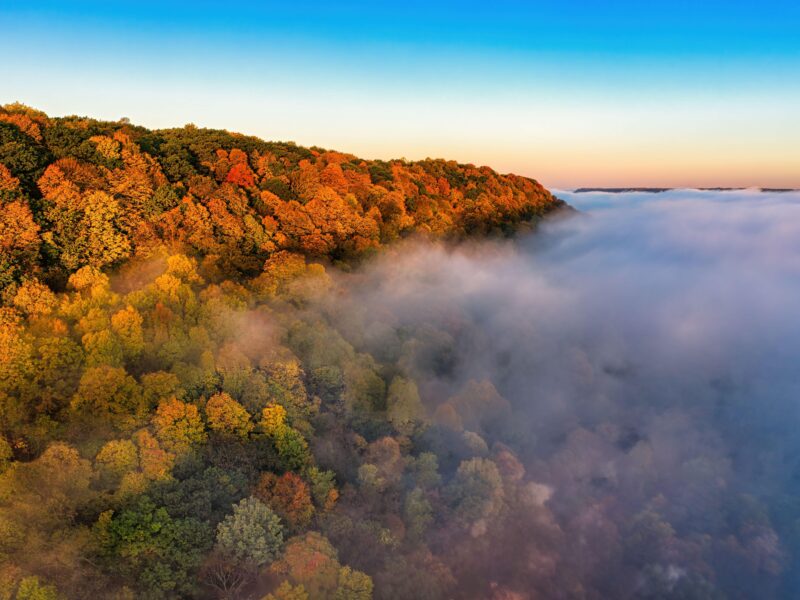 Stunning aerial view of colorful autumn forest and mist in Wacouta, Minnesota - Best National Parks for fall colors